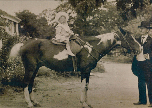Herbert Bowen on horse at Ellendale lead by his father George Bowen, probably about 1903/04